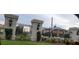 Ornate entrance to the community of Ridgemor at 4467 Worthington Ct, Palm Harbor, FL 34685