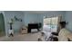 Living room with a piano, seating area and sliding doors to the pool area at 4467 Worthington Ct, Palm Harbor, FL 34685