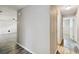 Hallway with tile floors and neutral walls at 1765 Thames St, Clearwater, FL 33755