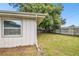 Grass backyard with wooden fence at 1765 Thames St, Clearwater, FL 33755