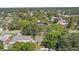 Aerial view showcasing a single-Gathering home's location within a residential neighborhood at 1765 Thames St, Clearwater, FL 33755