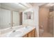 Main bathroom with double sinks and a separate shower and toilet at 2202 Green Oaks Ln, Tampa, FL 33612