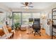 Spacious home office with hardwood floors and large windows at 3399 Mermoor Dr # 207, Palm Harbor, FL 34685