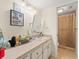 Clean bathroom with vanity and shower/tub combo at 3399 Mermoor Dr # 207, Palm Harbor, FL 34685