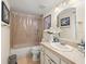 Second bathroom with updated vanity and bathtub at 3399 Mermoor Dr # 207, Palm Harbor, FL 34685