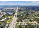 Aerial view of neighborhood, roads, and a body of water at 11303 86Th Ave, Seminole, FL 33772