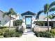 Resort-style community entrance with lush landscaping at 10823 Verawood Dr, Riverview, FL 33579
