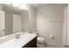 Clean bathroom with a single vanity, toilet and bathtub at 10823 Verawood Dr, Riverview, FL 33579