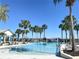 Large community pool with a relaxing patio area at 10823 Verawood Dr, Riverview, FL 33579