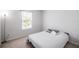 Cozy guest bedroom with a comfortable bed and natural light at 10823 Verawood Dr, Riverview, FL 33579