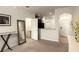 Open living room with kitchen island and view of entryway at 10823 Verawood Dr, Riverview, FL 33579