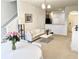 Open concept living and dining area with a cozy sofa at 10823 Verawood Dr, Riverview, FL 33579