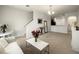 Bright and airy living room featuring a comfortable seating area at 10823 Verawood Dr, Riverview, FL 33579