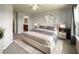Spacious primary bedroom with ensuite bathroom and plenty of natural light at 10823 Verawood Dr, Riverview, FL 33579