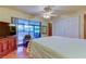 Bedroom with private access to a screened patio at 9537 86Th Ave # 9537, Seminole, FL 33777