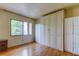 Bright bedroom with hardwood floors and built-in wardrobe at 9537 86Th Ave # 9537, Seminole, FL 33777
