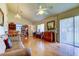 Bright living area with hardwood floors and view to dining area at 9537 86Th Ave # 9537, Seminole, FL 33777