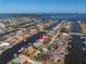 Aerial view showcasing home's waterfront location at 1973 Hawaii Ne Ave, St Petersburg, FL 33703