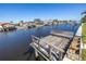 Wooden dock with bench overlooking the canal at 1973 Hawaii Ne Ave, St Petersburg, FL 33703