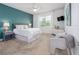 Comfortable bedroom with a large window and stylish furniture at 18827 Boatwright Cir, Land O Lakes, FL 34638