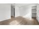 Bright bedroom with light hardwood floors, recessed lighting, and ample closet space at 5024 W Dickens Ave, Tampa, FL 33629
