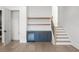 Close-up view of beverage center and wood stairs in a light and bright room at 5024 W Dickens Ave, Tampa, FL 33629