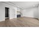 Spacious living room with a beverage center, wood floors and stairs to the second floor at 5024 W Dickens Ave, Tampa, FL 33629