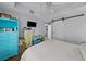 Bedroom with a dresser and a barn door at 800 S Dakota Ave # 116, Tampa, FL 33606