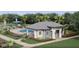 Community pool with cabana and playground nearby at 2719 Winding Creek Trl, North Port, FL 34289