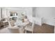 Small dining area with round table and four light-beige chairs at 315 15Th N St, St Petersburg, FL 33705