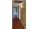 Bright hallway with parquet flooring and access to other rooms at 11201 80Th Ave # 201, Seminole, FL 33772