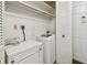 Laundry room with side-by-side washer and dryer units at 11200 102Nd Ave # 33, Seminole, FL 33778