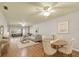 Bright living room featuring a dining area, neutral furniture, and great lighting at 11200 102Nd Ave # 33, Seminole, FL 33778