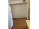Small dining area adjacent to the kitchen with wood floors at 2688 Pine Ridge N Way # D1, Palm Harbor, FL 34684
