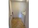 Compact laundry room with washer and dryer hookups at 2688 Pine Ridge N Way # D1, Palm Harbor, FL 34684