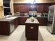 Spacious kitchen with island and stainless steel appliances at 2001 Rain Dance Pl, Brandon, FL 33510