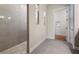 Modern bathroom featuring a walk-in shower and neutral tile at 4943 Ribbon Rock Cv, Lakewood Ranch, FL 34211