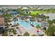 Aerial view of community pool and surrounding landscape at 4943 Ribbon Rock Cv, Lakewood Ranch, FL 34211