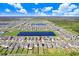 Wide aerial view of the house and neighborhood at 16764 Delia St, Wimauma, FL 33598