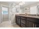 Elegant bathroom with granite vanity and glass shower at 5018 Sunnyside Ln, Bradenton, FL 34211