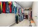 Spacious walk-in closet with ample shelving and hanging space at 5018 Sunnyside Ln, Bradenton, FL 34211