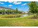 Community with pond and townhomes at 5018 Sunnyside Ln, Bradenton, FL 34211