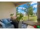 Relaxing screened porch overlooking a pond at 5018 Sunnyside Ln, Bradenton, FL 34211