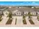 Four-unit townhouse building with individual garages at 5018 Sunnyside Ln, Bradenton, FL 34211