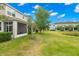 Community backyard with pond and lush landscaping at 5018 Sunnyside Ln, Bradenton, FL 34211