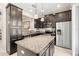 Modern kitchen with stainless steel appliances and granite countertops at 5018 Sunnyside Ln, Bradenton, FL 34211