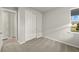 Charming bedroom with carpet flooring, a closet, and a window with natural light at 11269 Boundless Ter, Venice, FL 34293
