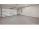 Spacious garage with epoxy flooring and an automatic garage door at 11269 Boundless Ter, Venice, FL 34293