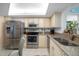Kitchen with stainless steel appliances and granite countertops at 690 Island Way # 812, Clearwater Beach, FL 33767