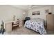 Bedroom includes a queen-size bed, desk and ceiling fan at 690 Island Way # 812, Clearwater Beach, FL 33767